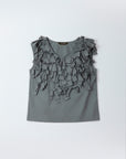 Flat lay of Yaccomaricard Hane Vest in Metal grey showing the intricate cotton ribbon design.