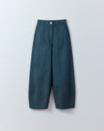 Flat lay of Yaccomaricard Obaru Trouser in Stone Blue showing the garment-dyed textured cotton.