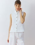 Front view of Kantan Jersey Waistcoat in white by Yaccomaricard showing casual layering.