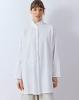 Front of the signature diagonal pintuck on the White cotton lawn Tunic Shirt by Yaccomaricard Sppring Summer 26.