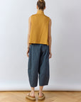 Back view of Yaccomaricard Obaru Trouser in Stone Blue featuring signature pintuck panels.
