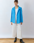 Front view of Nikku Shirt in hana blue by Yaccomaricard London, longline cotton shirt with Nehru collar.