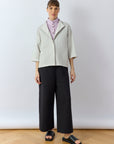 Model wearing Yaccomaricard Faneru Jersey Jacket in Cool Grey – contemporary style.