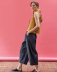 Side of the Yaccomaricard Obaru trousers in stone blue with refined texture.