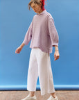 Full length view of the Sode Jersey Pullover in Lilac Purple with a relaxed silhouette.