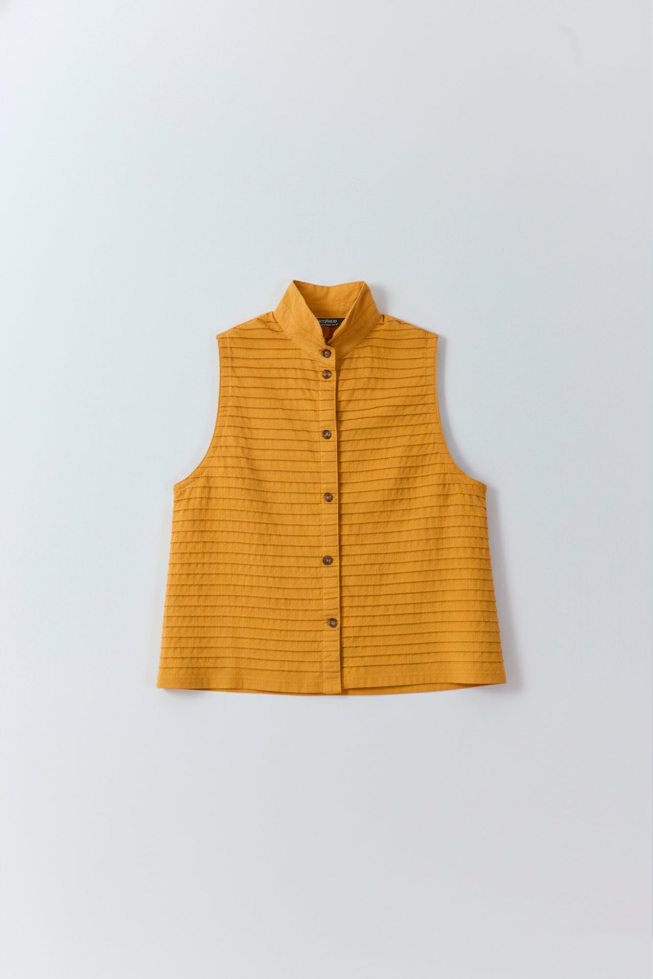 Flat lay of Kantan jersey waistcoat by Yaccomaricard in brown sugar.