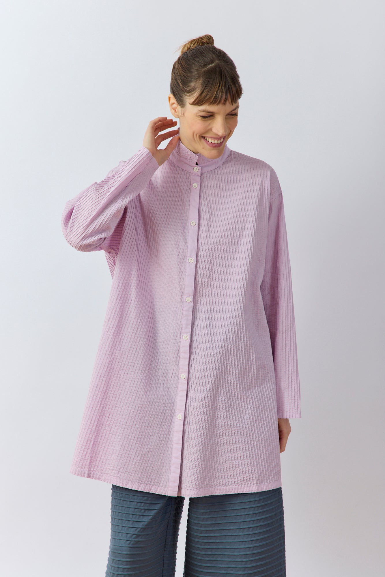 Model wearing Yaccomaricard Classic Tunic Shirt in Lilac Purple – Effortless Japanese designer layered style.