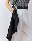 Yaccomaricard Sukafu Belt in Black – Japanese designer cotton lawn pintuck swing belt.
