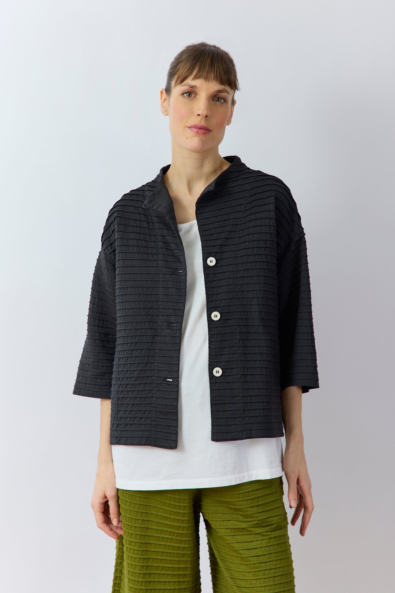 Front view of Yaccomaricard Faneru Jersey Jacket in Black showing soft cotton fabric and relaxed shape.