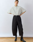 Yaccomaricard Obaru Trouser in Black – Japanese designer cropped cotton pintuck trouser.