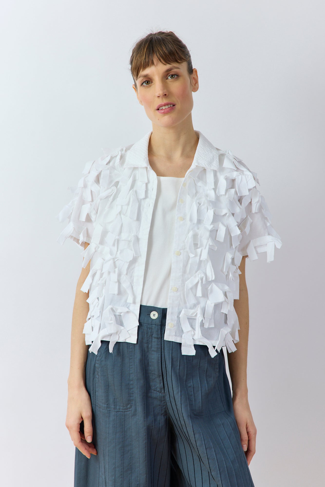Yaccomaricard Hane Shirt in White – Japanese designer cotton lawn statement overshirt.