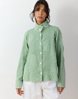 Shibo Jacket in Powder Green – lightweight pintuck jacket front view.