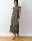 Model wearing Ash Shibo Shell Top styled casually, showing relaxed fit and drape.