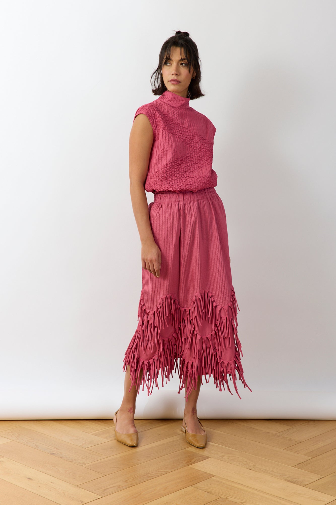 Yaccomaricard Kazari skirt in Dust Rose with elastic band combining style with practicality.