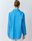 Back view of Yaccomaricard's Nikku Shirt in Hana blue with tailored fit and garment-dyed finish.