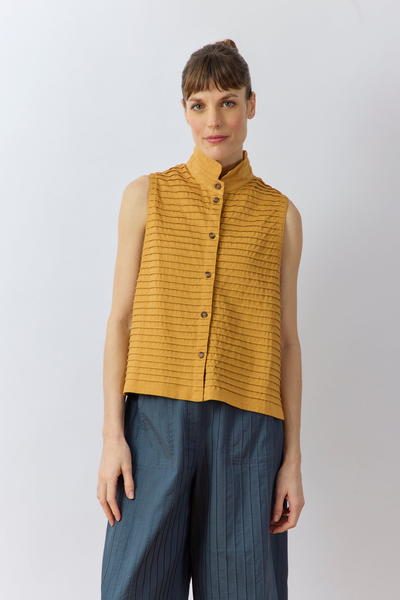 Front view of Kantan Jersey Waistcoat in brown sugar by Yaccomaricard, pintucked cotton jersey with stand‑up collar.