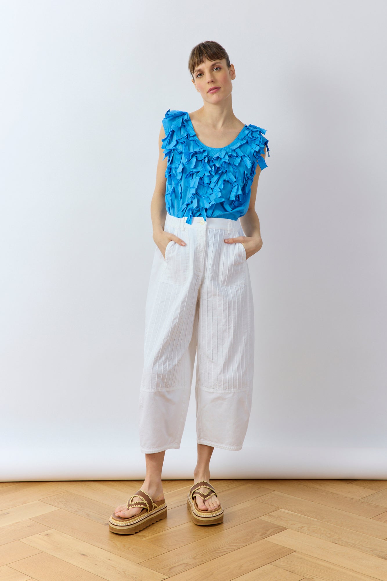 Full product shot of Hane Vest in hana blue by Yaccomaricard London, relaxed fit cotton vest.