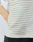 Close-up of pocket detail on Yaccomaricard Faneru Jersey Jacket in Cool Grey.