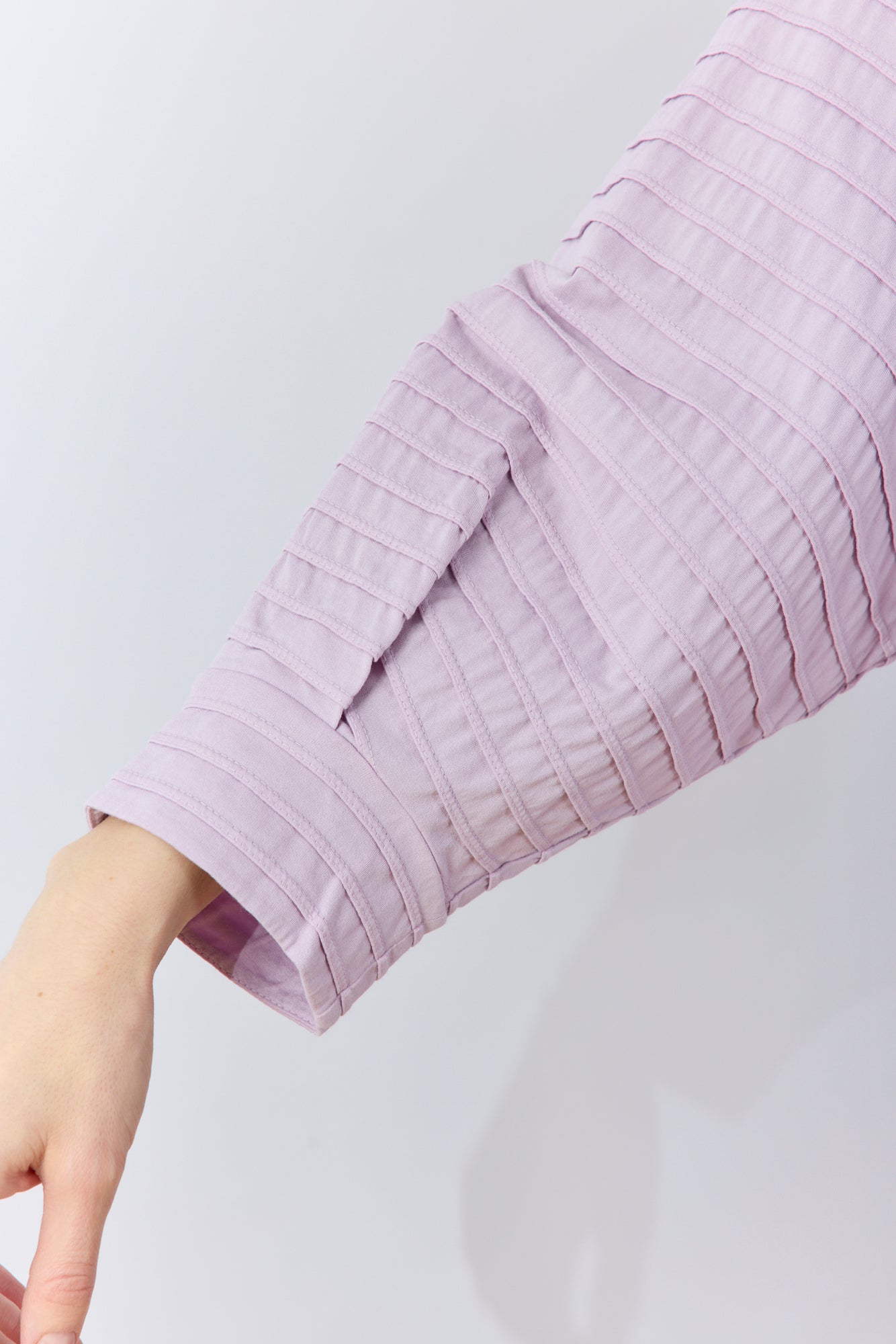 Detail shot of the fine cotton jersey texture sleeve on the Sode Pullover.