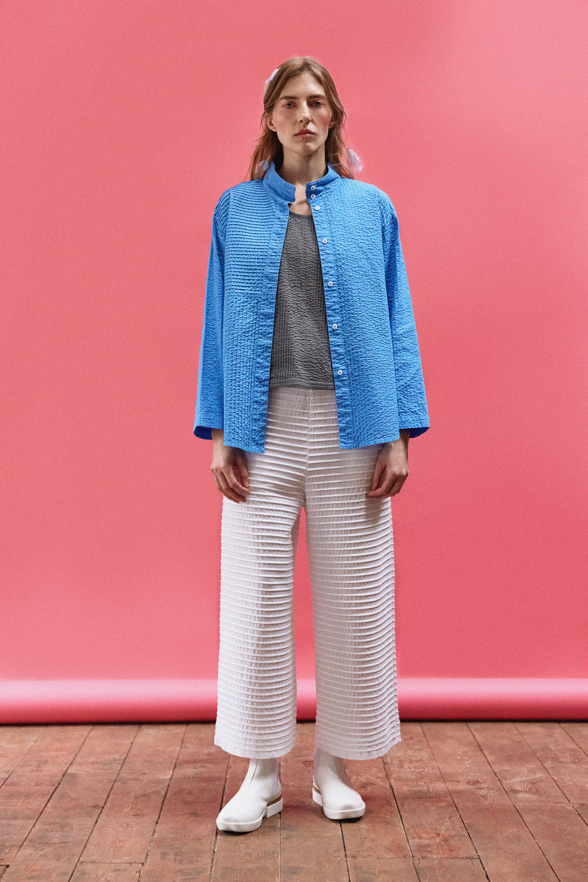 Model wearing Yaccomaricard Nikku Shirt in Hana Blue – Contemporary Japanese designer fashion.