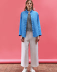 Model wearing Yaccomaricard Nikku Shirt in Hana Blue – Contemporary Japanese designer fashion.