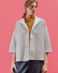 Model wearing Yaccomaricard Faneru Jersey Jacket styled with relaxed contemporary look.